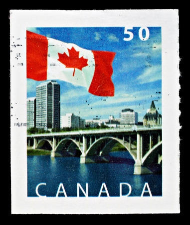 CANADA - CIRCA 2005: Used Canadian Flag Postage Stamp showing Broadway Bridge over South Saskatchewan River, circa 2005のeditorial素材