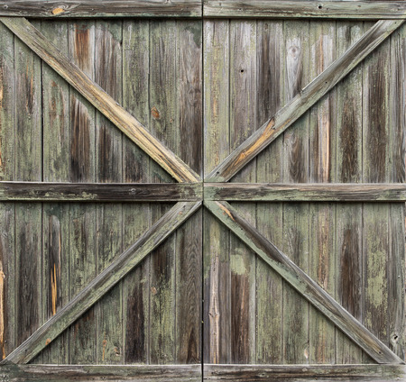Closed Old Aged Wooden Window Shuttersの写真素材
