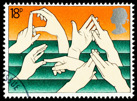 UNITED KINGDOM - CIRCA 1981: A British Used Postage Stamp Commemorating The Year of the Disabled Showing Sign Languageのeditorial素材