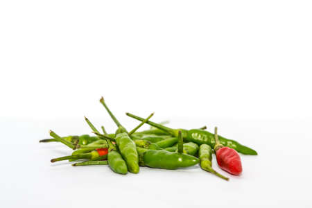 green and red chilli on white backgroundの写真素材