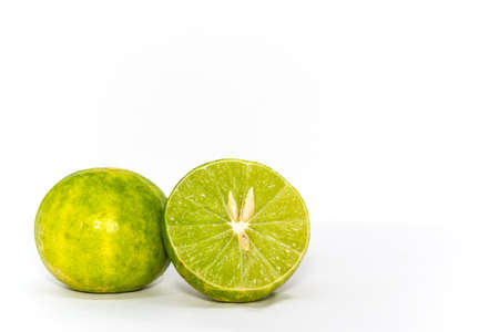 half cut lime on white backgroundの写真素材