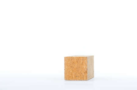 cubic shape cut wood with white backgroundの写真素材