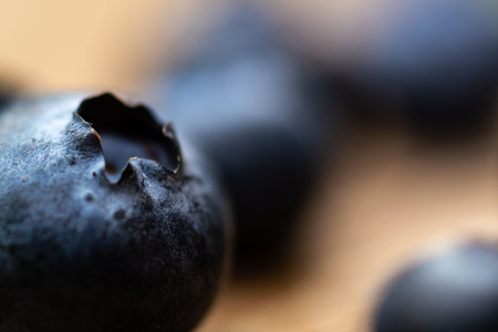 Blueberries on wooden floor close up