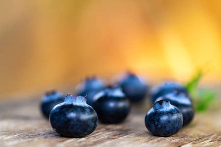 Blueberries on wooden floor close upの写真素材