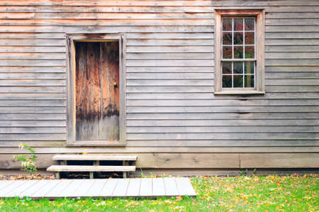 Vintage wooden door, wall and windowの写真素材