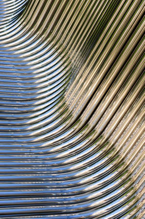 Twisted chrome pipes abstract pattern backgroundの写真素材