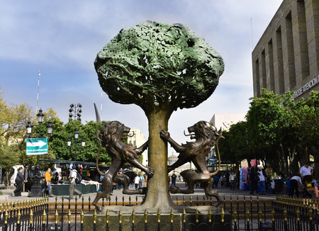 Statue lions and a treeのeditorial素材