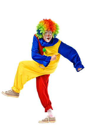Portrait of a clown over white backgroundの写真素材