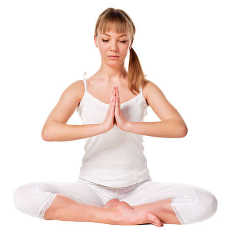 Beautiful young woman doing yoga exercise  Isolatedの写真素材
