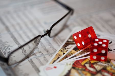 Newspapaer with tarots, dices and glassesのeditorial素材