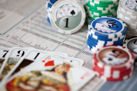 Newspapaer with poker chips and tarots