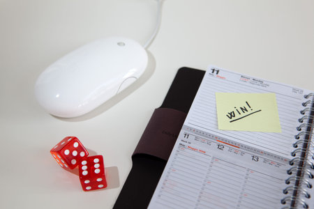 Agenda with dices and mouse