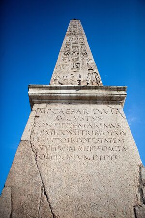 Piazza del popolo of Rome obelix with moonの写真素材