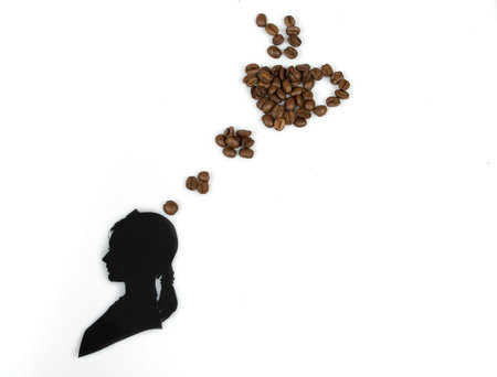 thinking about coffee isolated over whiteの写真素材