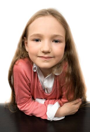 dreaming little girl isolated on white の写真素材