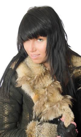 sexy young babe in fur coat isolatedの写真素材