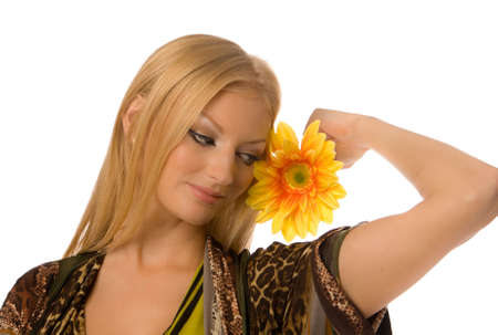 Blonde with yelllow flower isolated on whiteの写真素材