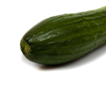 big fresh green cucumber isolated on whiteの写真素材
