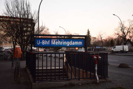 Entrance to U bahnhof Mehringdamm as the sun sets in Kreuzberg Berlinのeditorial素材