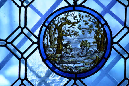 Stained glass man inside Peles Castle Sinaiaのeditorial素材