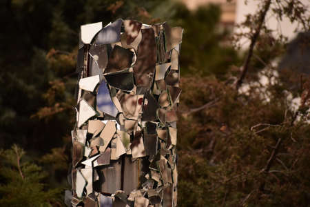 Reflective metal mirror statue in a park in Bucharestのeditorial素材