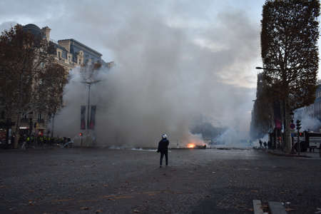 Giant cloud of tear gas and smoke in the streets of Parisのeditorial素材