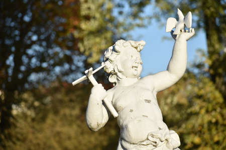 Statue of a child in the garden at schloss Charlottenburg palace in Berlinのeditorial素材