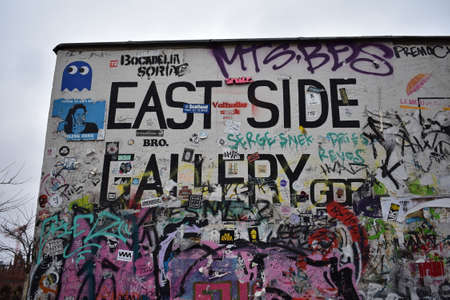Graffiti at the entrance of the East Side Gallery in Berlinのeditorial素材