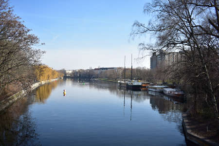 View of the Spree river with tree reflections in Kreuzberg Berlinのeditorial素材