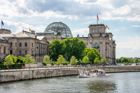 Landscape of the Spree river and the Reichstag government building in Berlin