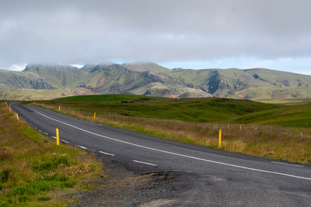Cloudy landscape of rural road near the Black Sand Beach Vik