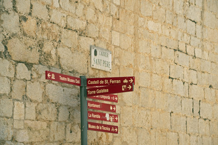 Landscape of signs outside of Theater Museum of Salvador Dali in Figueres Catalonia Spain