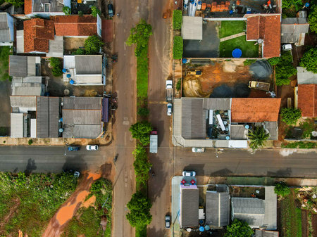 Aerial top down of roofs and rural roads in Tangara da Serra in Mato Grosso Brazil