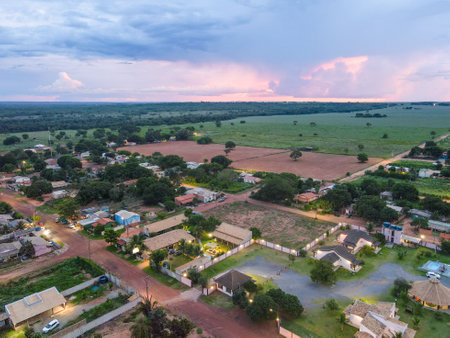 Aerial landscape of rainforest and village during summer sunset in Nobres Bom Jardim Mato Grosso Brazilのeditorial素材