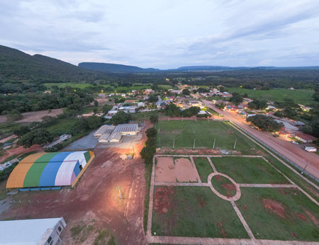 Aerial landscape of rainforest and village during summer sunset in Nobres Bom Jardim Mato Grosso Brazilのeditorial素材