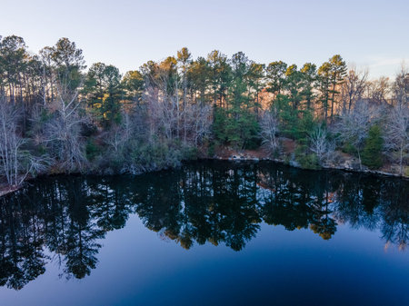 Aerial landscape of pond at Euchee Creek Greenway Trail during Fall in Grovetown Augusta Georgia USA