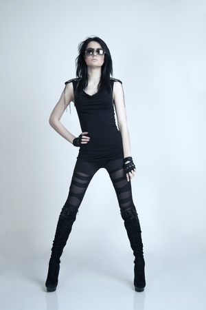 fashion portrait of a beautiful woman posing on a white backgroundの写真素材