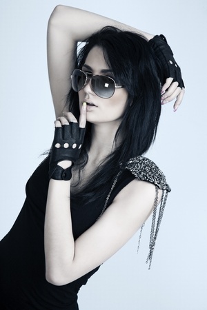 portrait of a beautiful girl with perfect skin with a light backgroundの写真素材