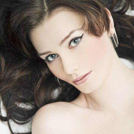 portrait of a person beautiful woman with perfect skin on a white backgroundの写真素材