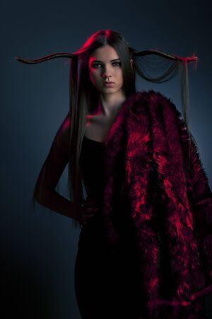 portrait of a beautiful woman wearing furの写真素材