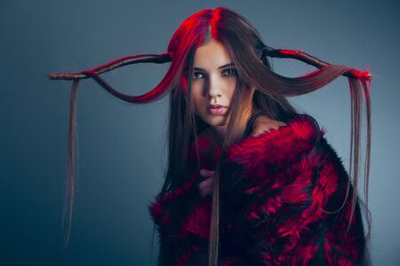 portrait of a beautiful woman wearing furの写真素材