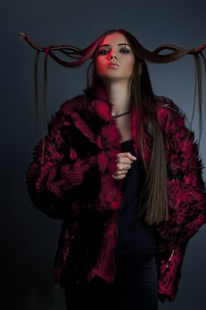 portrait of a beautiful woman wearing furの写真素材