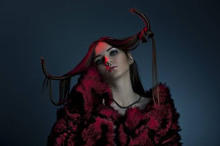 portrait of a beautiful woman wearing furの写真素材