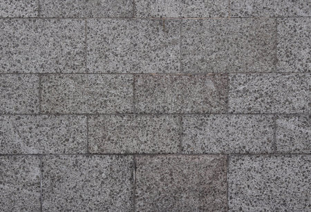 grey stone wall as backgroundの写真素材