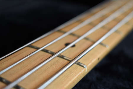 Guitar neck black backgroundの写真素材