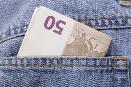 euros in the pocket of the jeansの写真素材