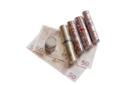 packages of coins on euro notes