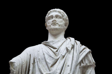 statue of a Roman senator on black backgroundの写真素材