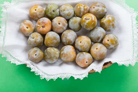 tray of plumsの写真素材