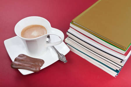 Relaxing time by reading some books and a cup of coffeeの写真素材